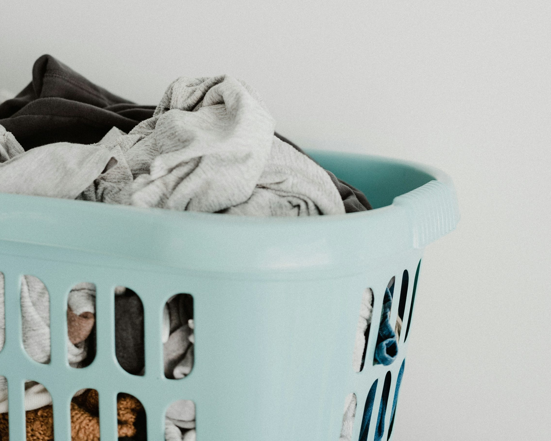 laundry basket with clothes inside