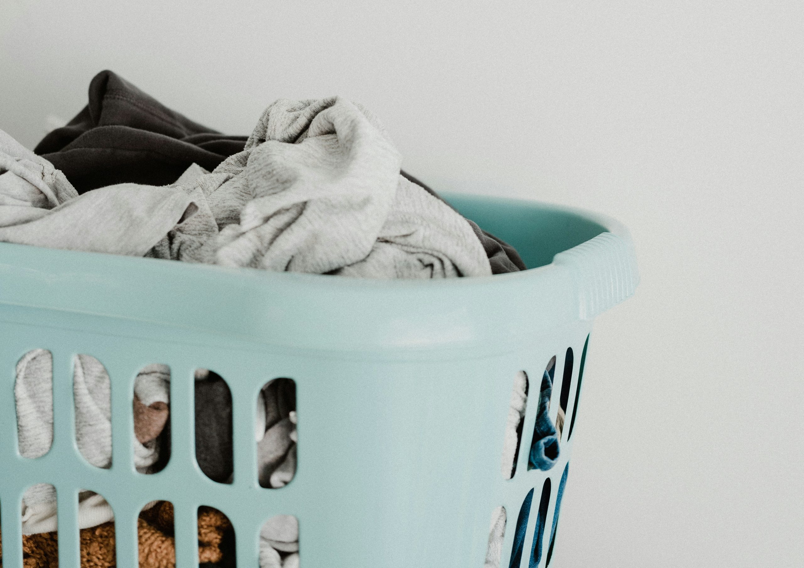 laundry basket with clothes inside